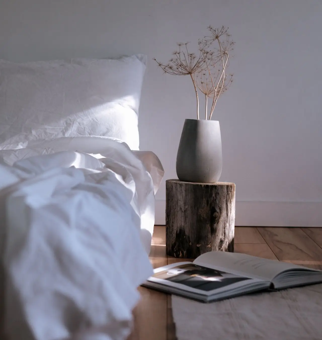 Textured textile on an upholstered bed edge